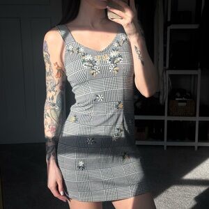 White + black gingham mini dress with embroidered flowers